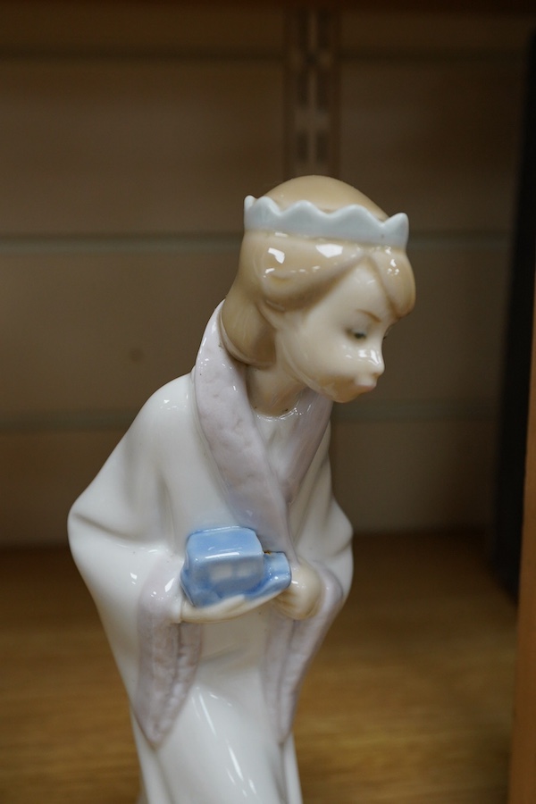 A Royal Doulton Images group and four LLadro figures